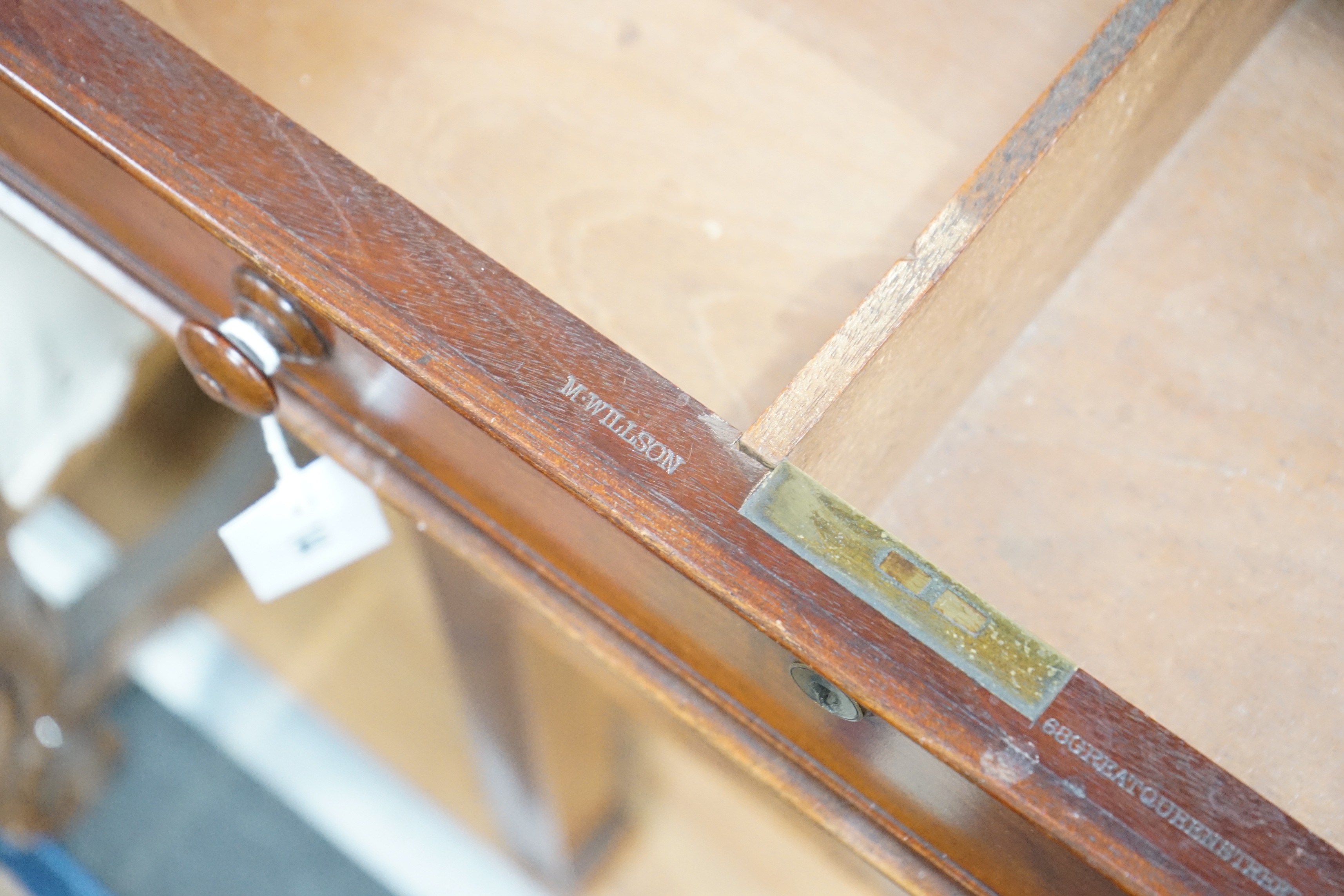 An early Victorian mahogany writing table stamped M Willson, 68 Great Queen Street, width 76cm, depth 48cm, height 74cm